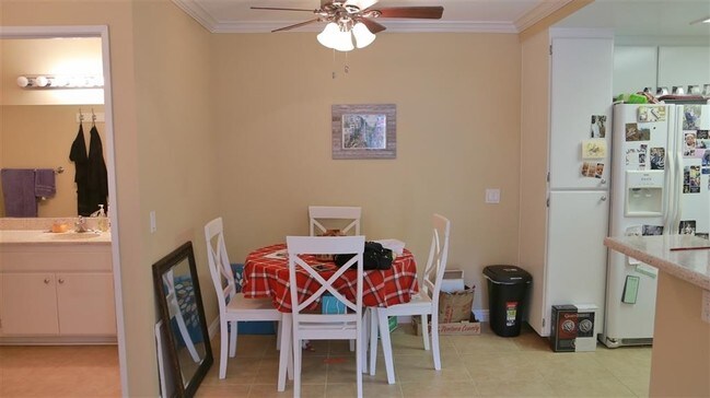 Dining Area w/ Ceiling Fan - 217 Woodland Pkwy Condo Unit 128