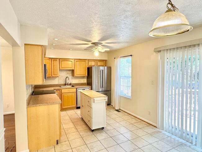 Photo - Bright Townhouse with Finished Basement, F...