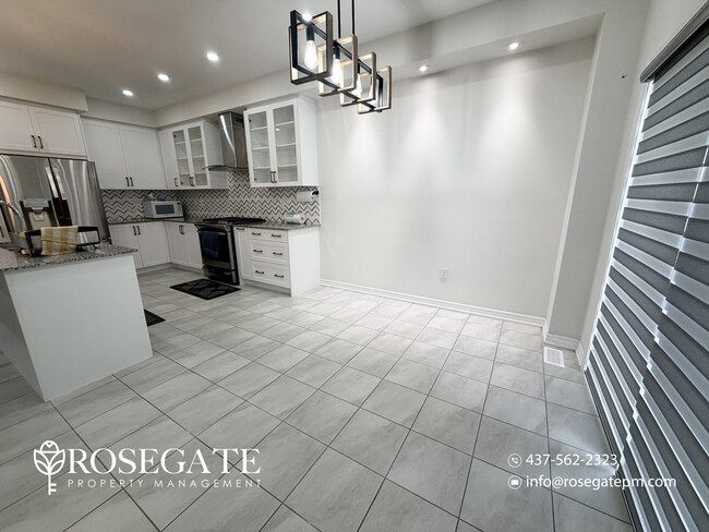 Photo - Spacious 4-Bedroom + Den Upper-Level Apartment with Garage & Backyard in Brampton Unit 1