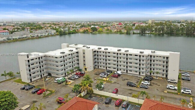Building Photo - 9917 W Okeechobee Rd Unit 3-303 Rental