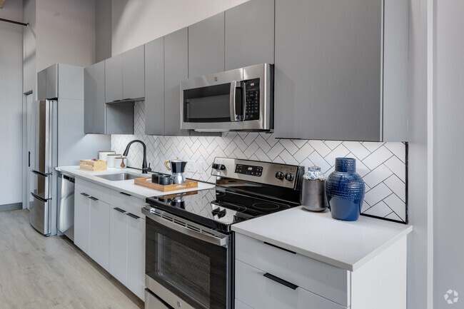 1 BR, 1 BA - 424-597 SF - Box Board Lofts