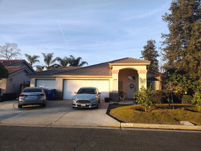 Building Photo - 5584 W Chennault Ave