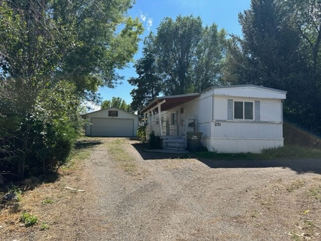 Building Photo - 3 bedroom mobile home with garage and bonus room