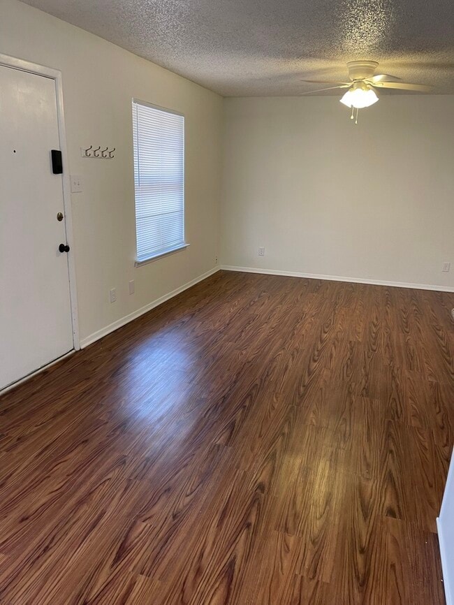 MOVE-IN READY. Single level, pet friendly front-end fourplex townhome, UPGRADED WIDE PLANK FLOORI...