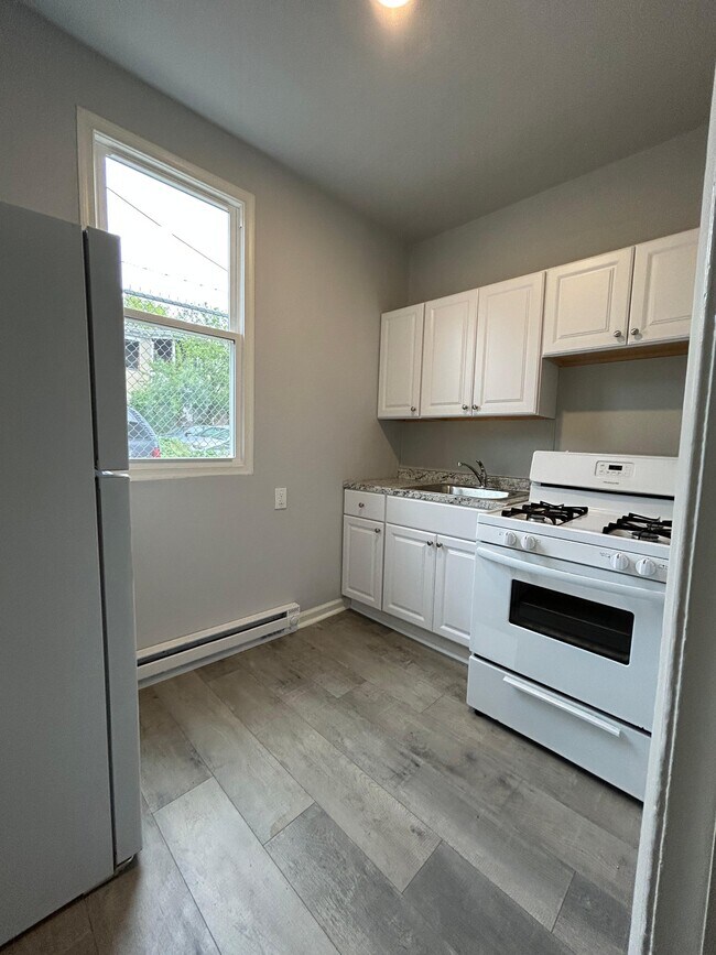 Building Photo - 1671 Orthodox St Unit 1F