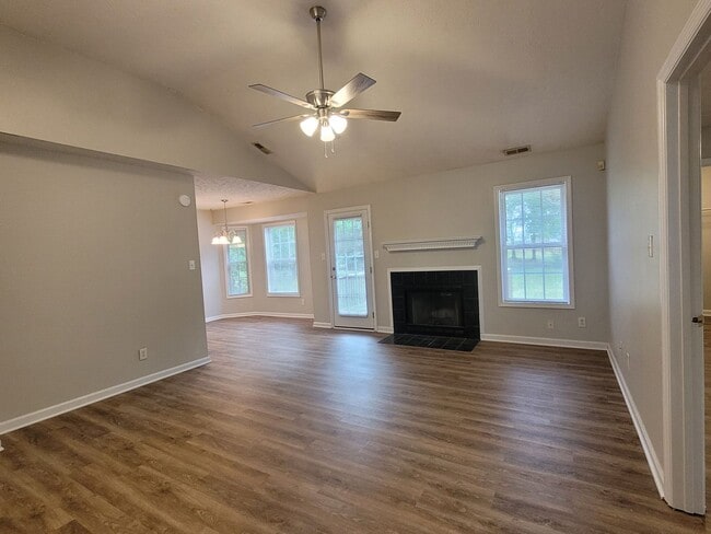 Photo - LVP floors, Large Yard! 3 BRM, 2 BHs, Double Garage!