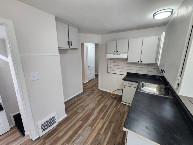 Photo - 2-Bedroom + Bonus Room Bungalow with Basement – Flexible Living Space