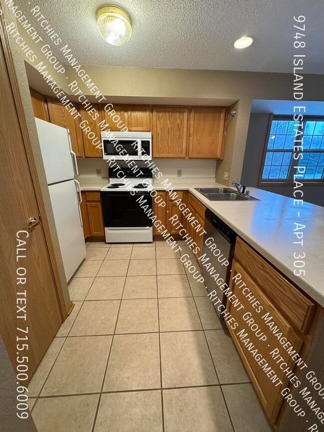 Building Photo - 9748 Island Estates Pl Unit Apt 305