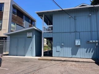 back view where parking is located + bicycle rooms