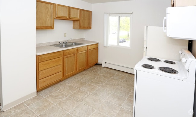 650/800 pies cuadrados, cocina - Crestview Apartment Homes