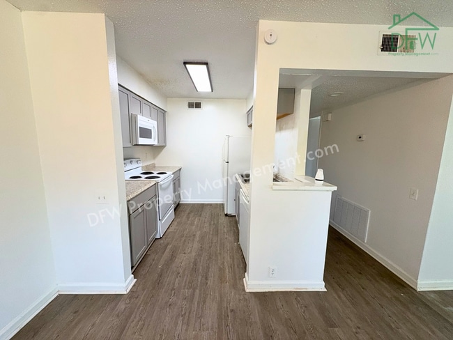 Photo - Inviting 3-Bedroom Condo with Fenced Backyard and Pool Access for LEASE in Irving, TX