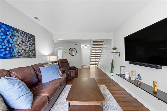 Photo - Updated 3BR Townhome — Assigned Parking, HOA Included, Military Welcome. Move in by March 31st an...