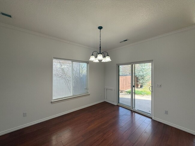 Photo - SPACIOUS LAYOUT! HARD SURFACE FLOORING, FENCED YARD & LARGE PATIO!