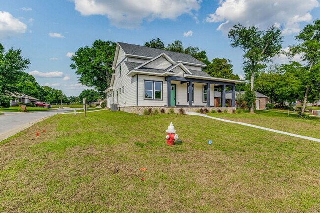 This luxurious new custom home in the sought-after Shadow Grove subdivision is a masterpiece of m...
