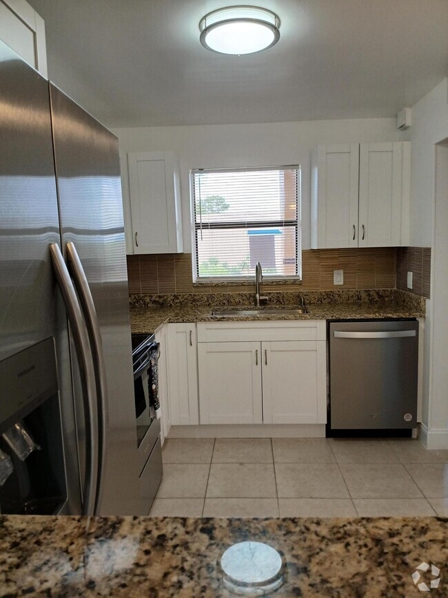 Building Photo - 4760 Lucerne Lakes Blvd E Unit 405 Rental