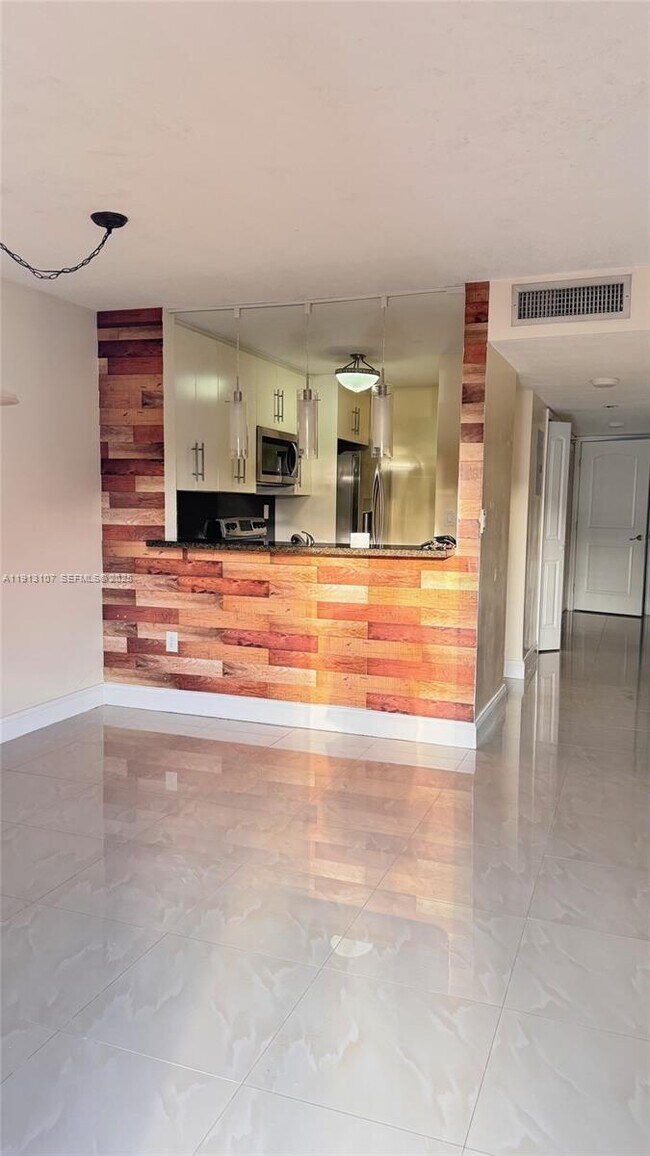 Building Photo - 15610 SW 80th St Unit J-104