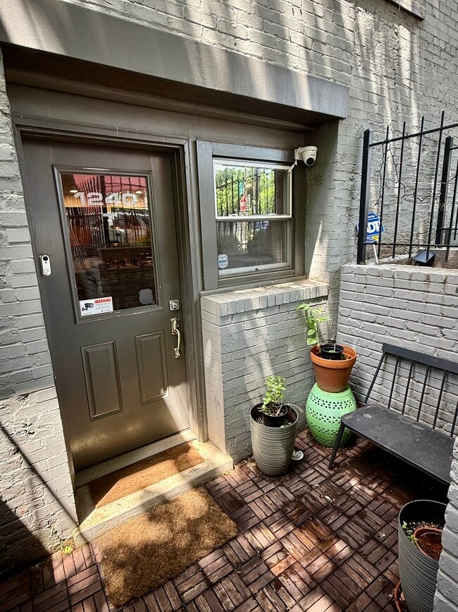 The front door is just steps off the 4th street, with space to set things down as you pen the door. - 1240 4th St NW Condo Unit 1240T 4th St