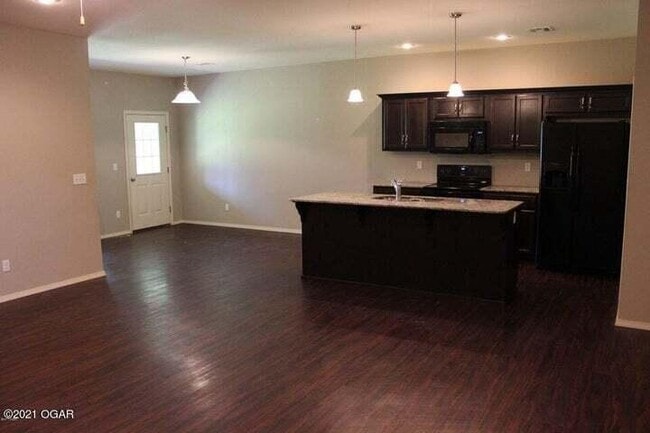Photo - 5061a Raintree Cir Unit B