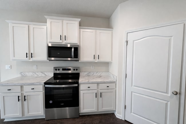 Photo - 5 Bedroom Home with Flex Room & First-Floor Guest Suite