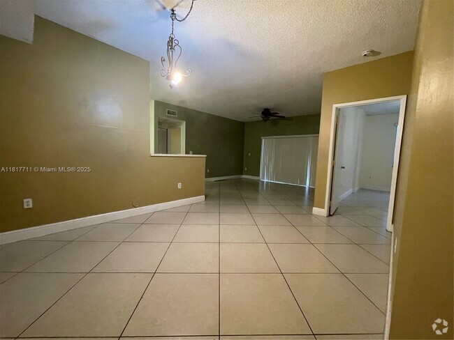 Building Photo - 6984 SW 39th St Unit H102 Rental