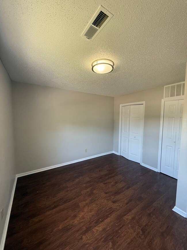 Building Photo - Three bedroom, two bath condo in High Point Unit 1806-E Woods Lane