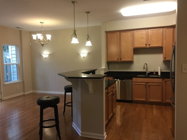 Move in ready townhome with garage and fen... - Move in ready townhome with garage and fen...