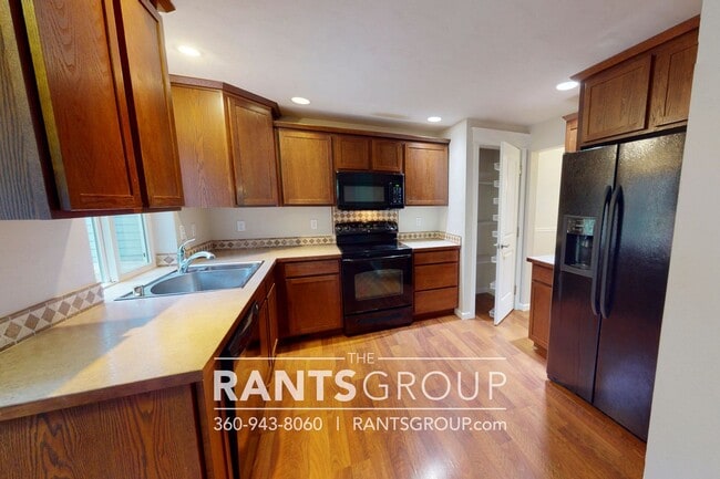 Photo - 4-bedroom, 2-bathroom Home with Green Belt in A Prime Location!