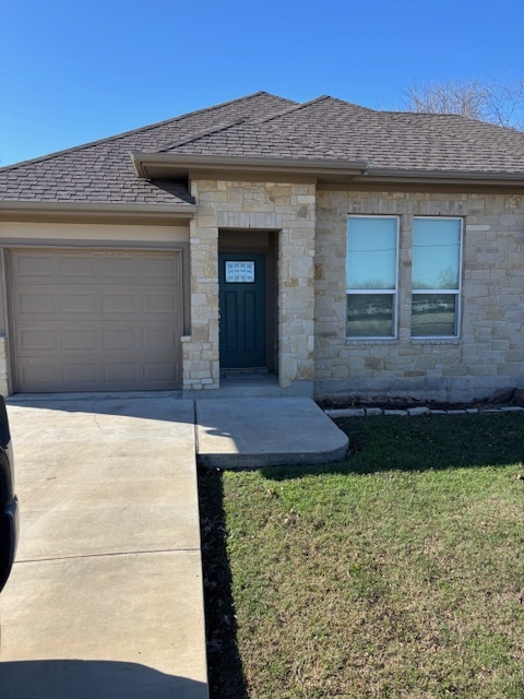 Front of duplex - 301 Sloan St Townhome