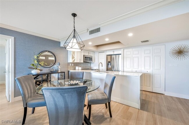 Building Photo - 6849 Grenadier Blvd Unit 503 Rental