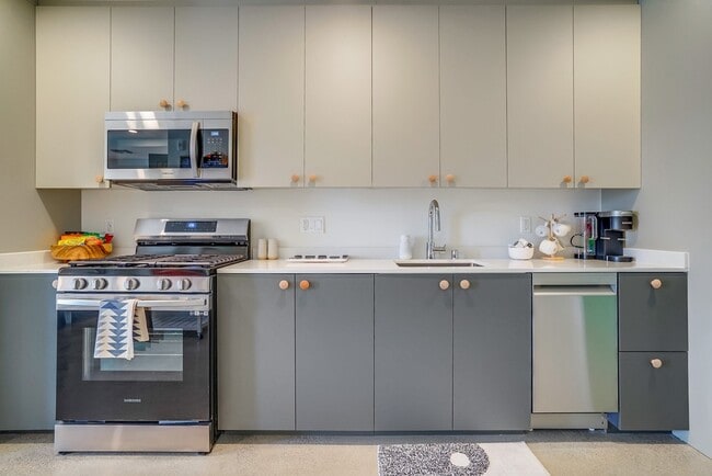 Kitchen at The Jagger Apartments in West Los Angeles featuring Studios, One Bedroom Apartments and P