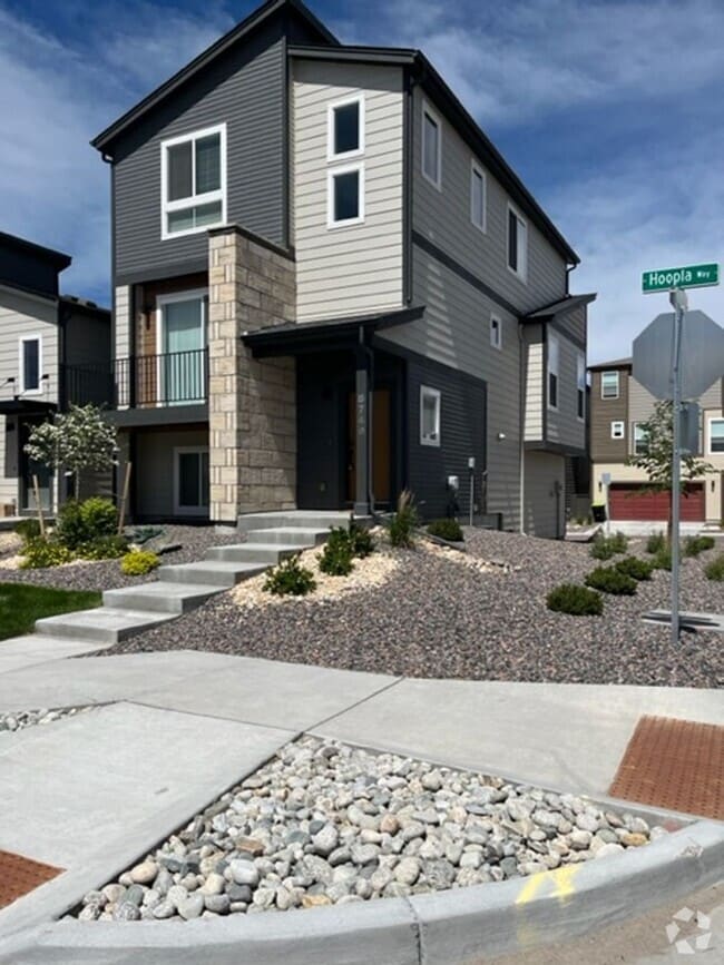 Building Photo - MODERN THREE STORY TOWNHOME WITH 2 CAR GAR...