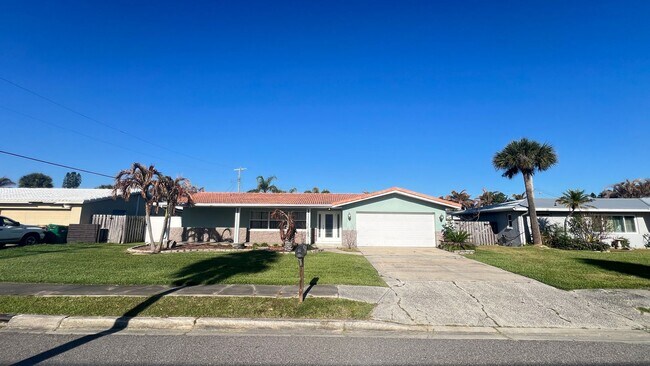 Photo - IMMACULATE 4 Bedroom, 2 Bathroom Home in Cocoa Beach!! ONLY MINUTES from the Beach!! (Lawn Care I...