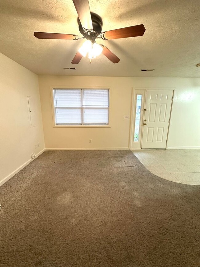 Photo - 3-Bedroom Home with Large Backyard & Carport