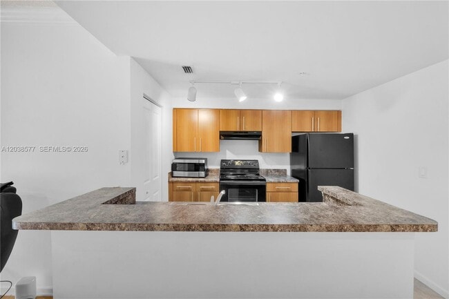 Photo - 5880 W Sample Rd Unidad 203