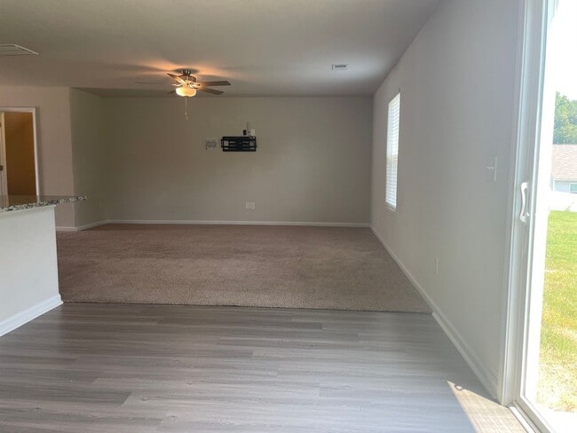 Photo - Spacious 3-bedroom with a massive Owner's Retreat and Dual Closets.