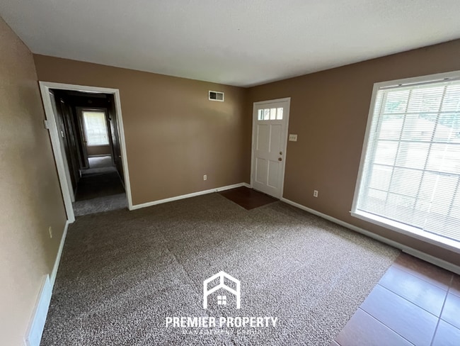 Photo - Spacious 4BR/2BA Whitehaven Home | 1,701 Sq Ft, Brick Fireplace & Quiet Cove