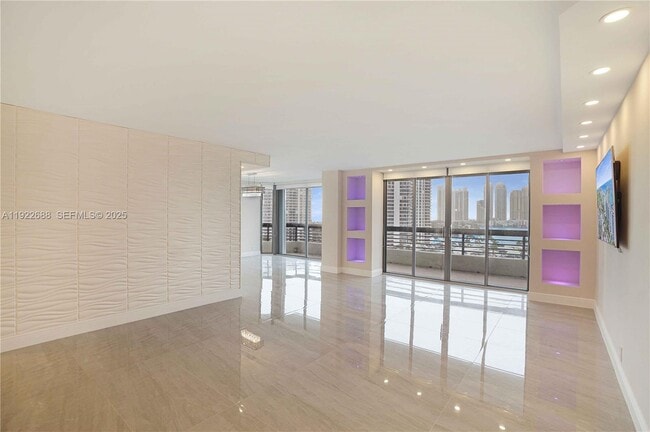 Building Photo - 3500 Mystic Pointe Dr Unit 1206