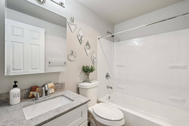 Bright, updated bathroom in a one-bedroom unit at Foster Creek in Tukwila, WA.