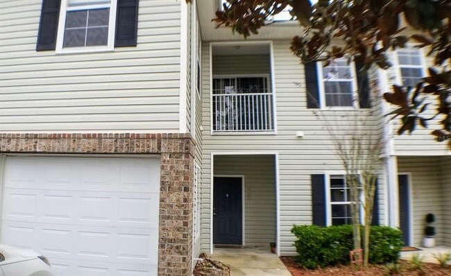 Building Photo - 4335 NW 48th St Unit 105
