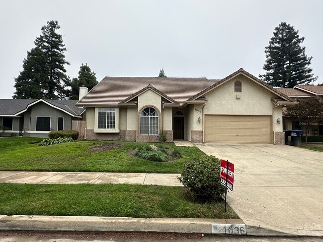 Building Photo - NE Visalia home coming soon