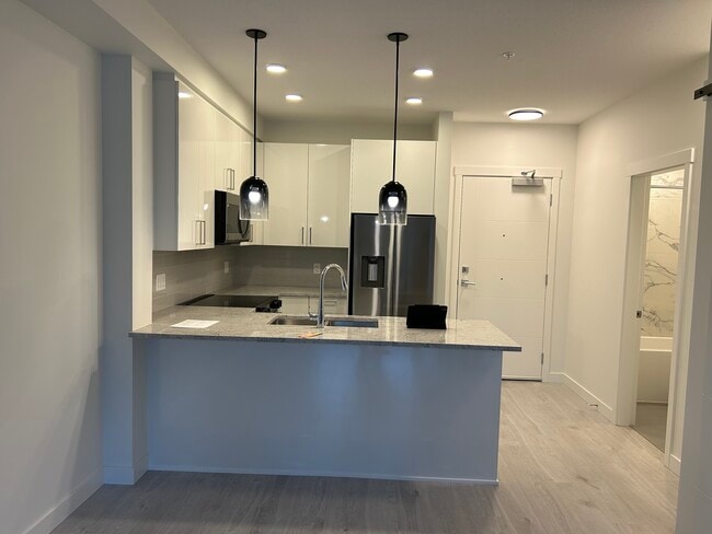 Photo - 5504 Brydon Cres Unit 211