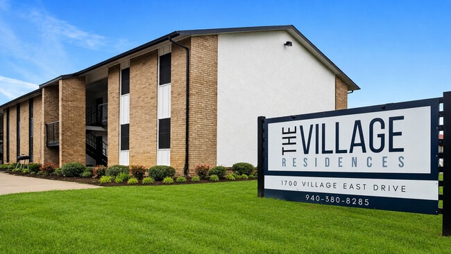 Building Photo - The Village Residences