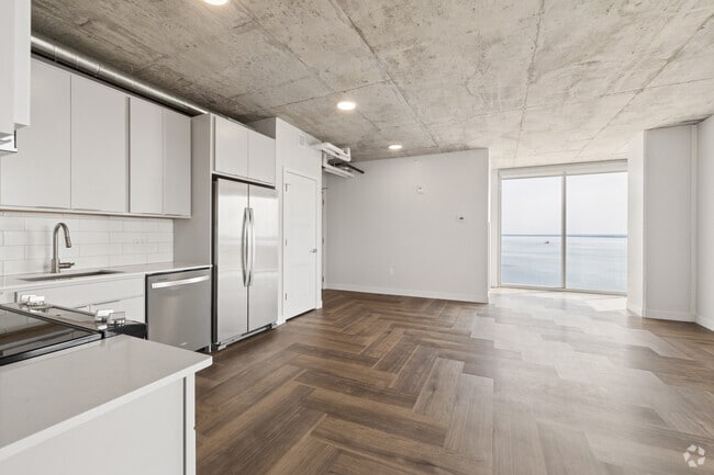 2BR, 2BA - 1,130SF - Kitchen and Living Room