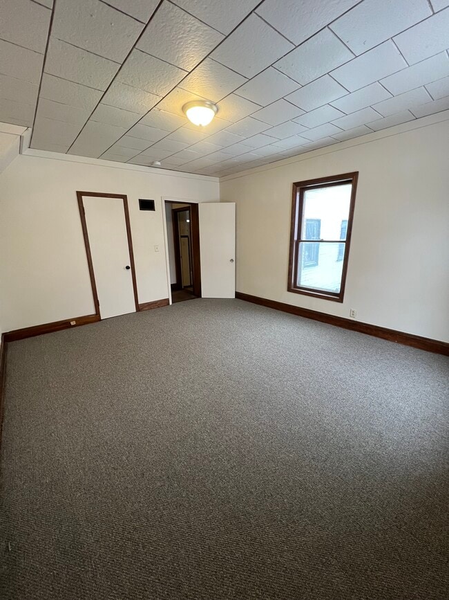Primary Bedroom - 101 Pleasant St Unit 1