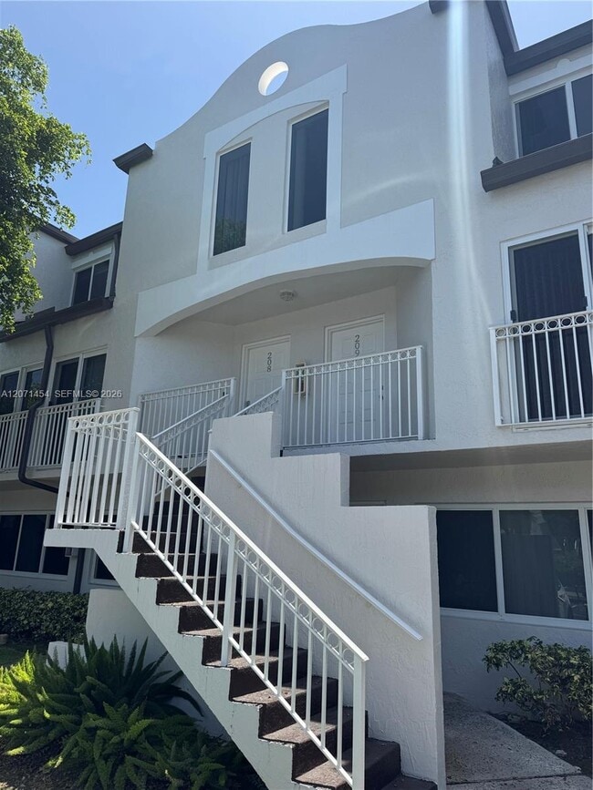 Building Photo - 8670 NW 6th Ln Unit 4-208