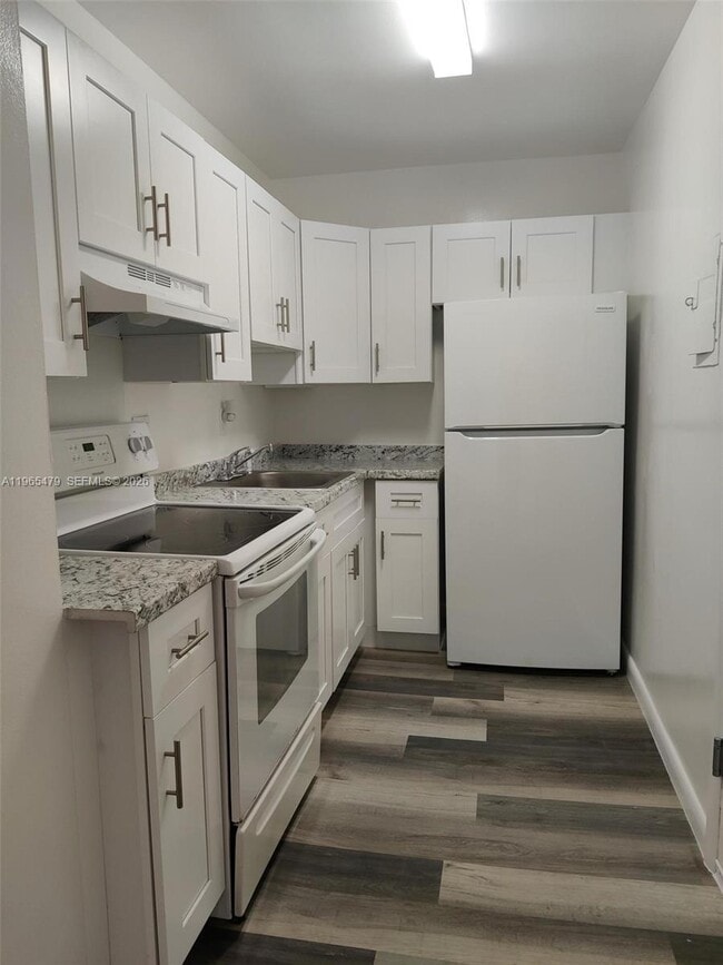 Building Photo - 5950 NE 18th Ave Unit 504