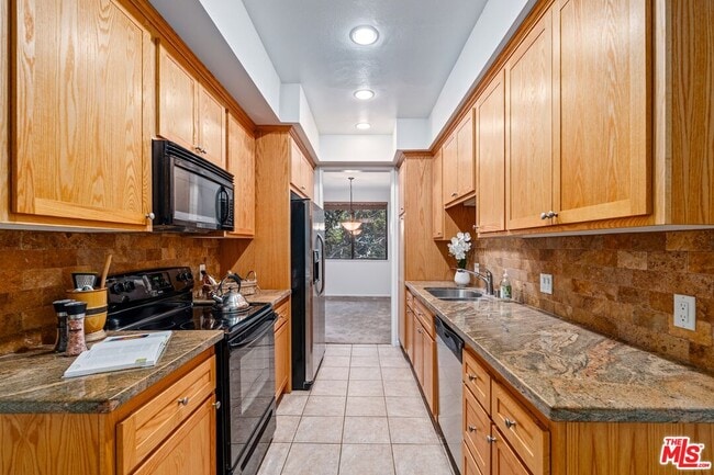 Building Photo - 306 Bora Bora Way Unit 114