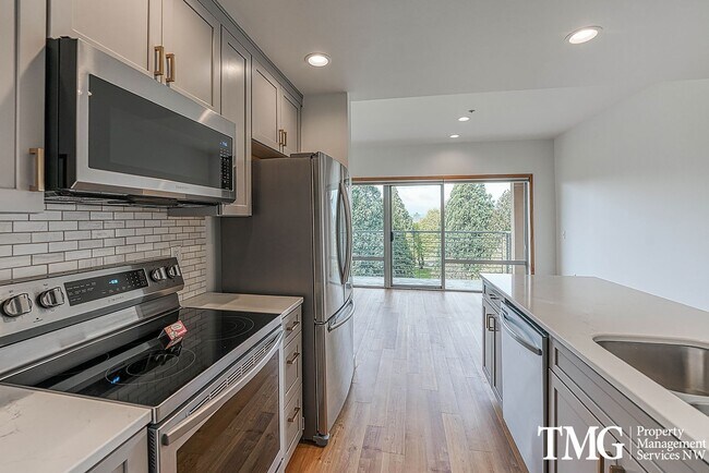 Photo - Top-Floor 2BD/2BA Condo w/ Stunning Park Views & Utilities Included Unit 704
