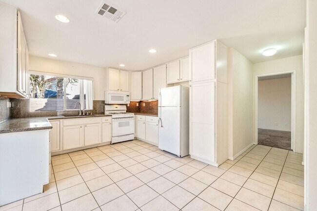 Photo - Spacious 4BR Home with Main-Level Primary Suite & No HOA!