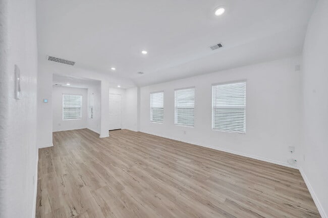 Photo - Like-new three bedroom single story home featuring a spacious open floor plan ideal for modern li...